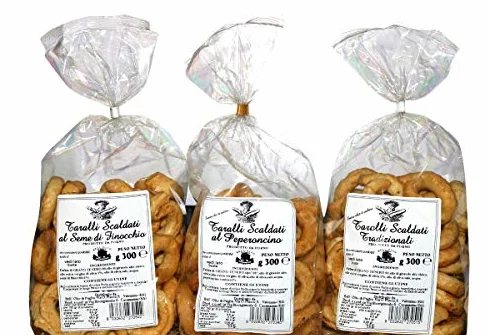 Pack 3 Taralli di Puglia. Produit de boulangerie idéal pour les collations. Le paquet contient des taralli avec de l'huile d'olive, des graines de fenouil
