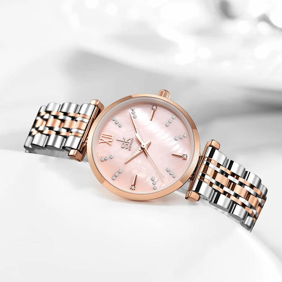 SHENGKE SK Montre Classique pour Femme avec Bracelet en Acier Inoxydable et Cuir véritable